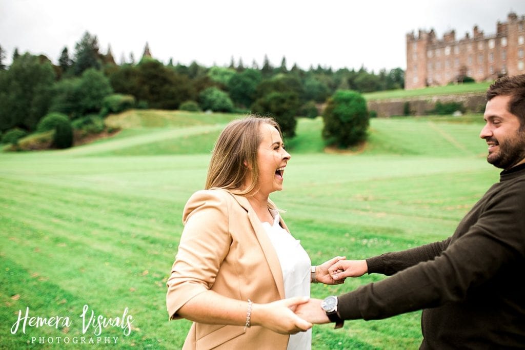 Drumlanrig castle couple engagement shoot lauging