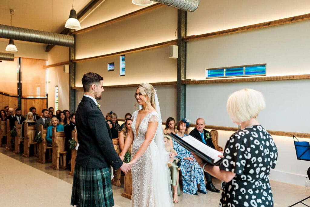 ceremony room with bride and groom at cairns farm estate