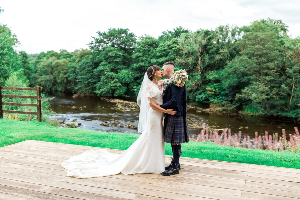  couples photos looking out over the river