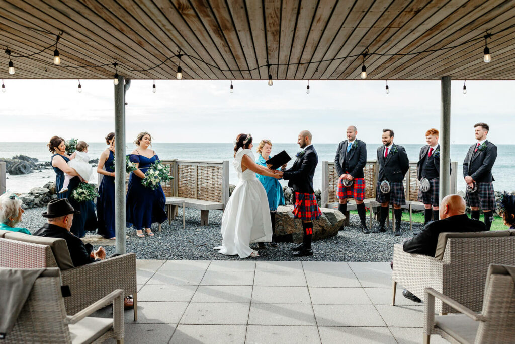 outdoor wedding ceremony on beach at knockinaam lodge